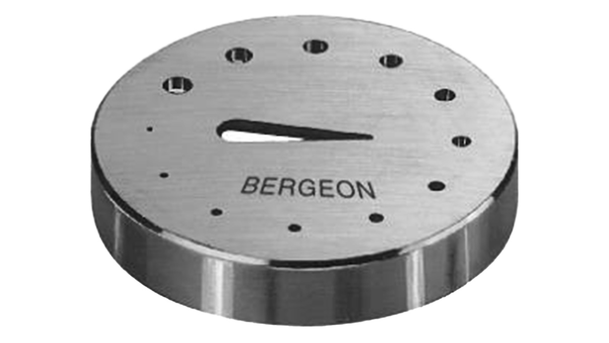 Bergeon 30110 Holder (adjuster perforated plate) for hairspring and balance with 12 holes and 1 notch drop shape, stainless steel, Ø 35
mm