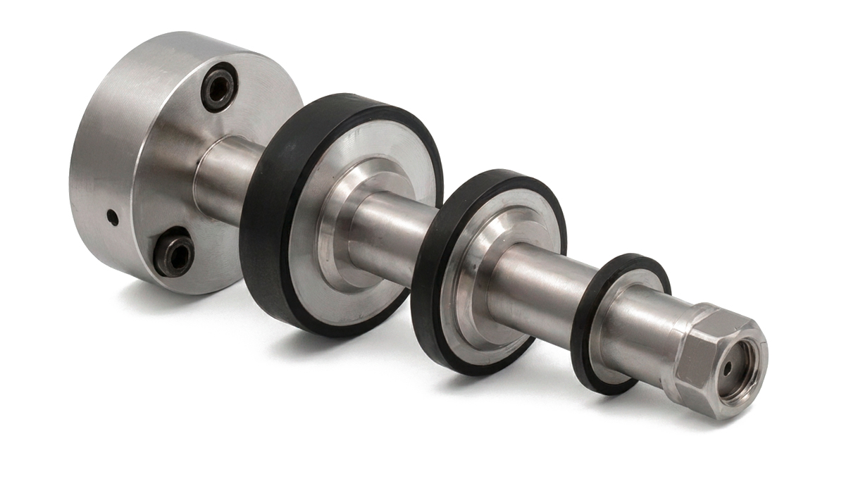 Micromecalp Washer shaft with three different-sized wheels for mounting abrasive
paper, including four spacers and four flanges
