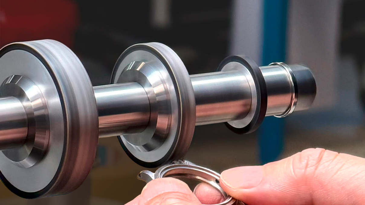 Micromecalp Washer shaft with three different-sized wheels for mounting abrasive
paper, including four spacers and four flanges