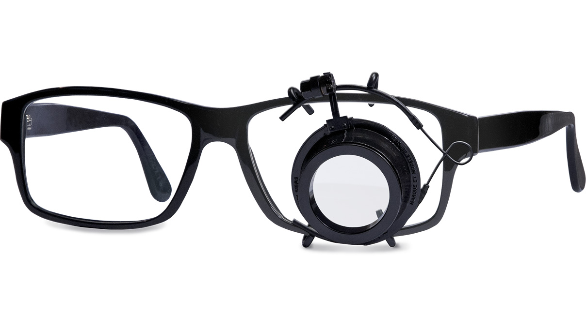 Ary Mini Eyeglass Magnifier, left, 6,5x