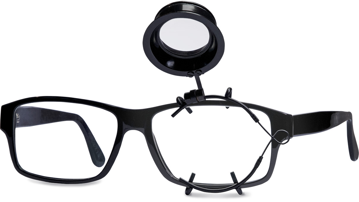 Ary Mini Eyeglass Magnifier, left, 6,5x